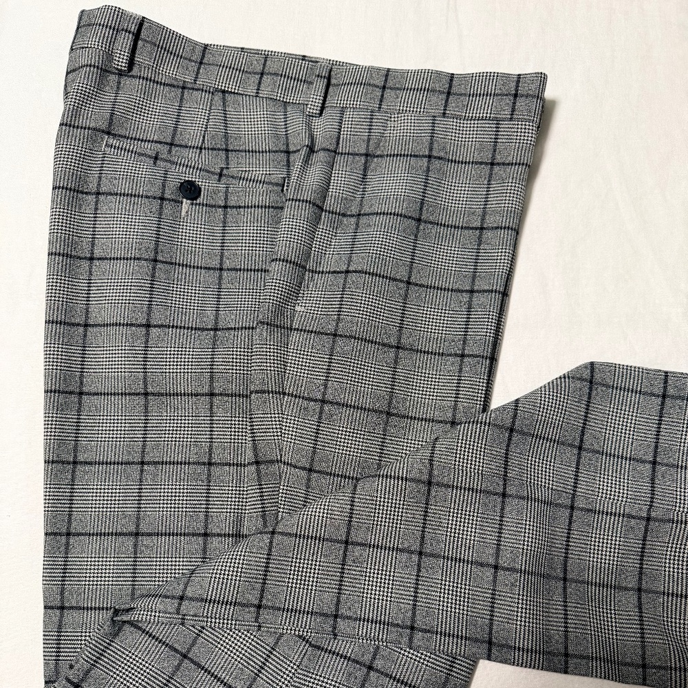 Gently worn and meticulously cared tailored plaid trousers